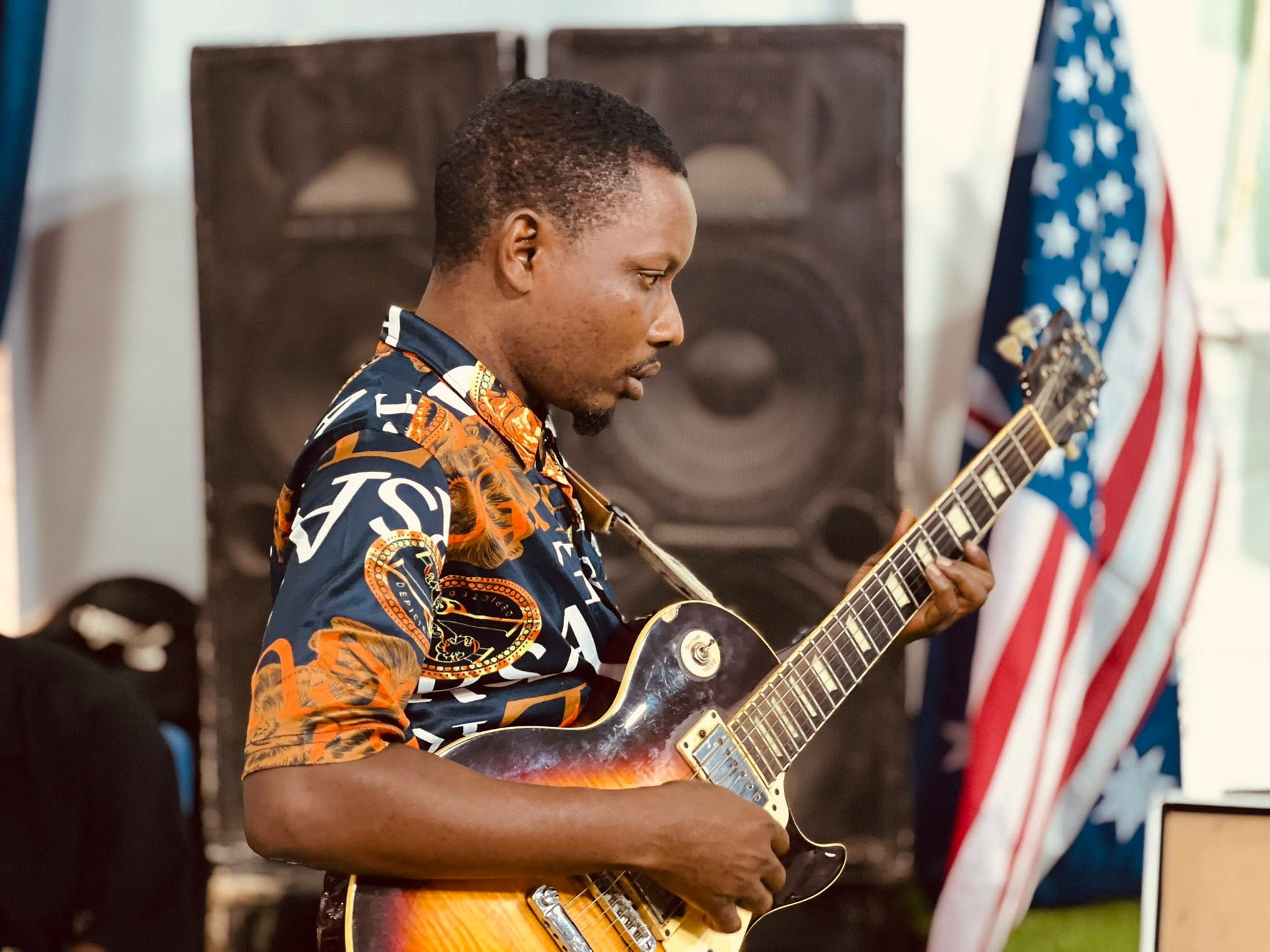 Guitarist playing during a church gathering